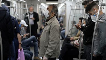FILE PHOTO: Iranians wear protective face masks, following the outbreak of the coronavirus disease (COVID-19), as they travel on the metro, in Tehran, Iran, May 20, 2020. WANA (West Asia News Agency)/Ali Khara via REUTERS ATTENTION EDITORS - THIS PICTURE WAS PROVIDED BY A THIRD PARTY/File Photo