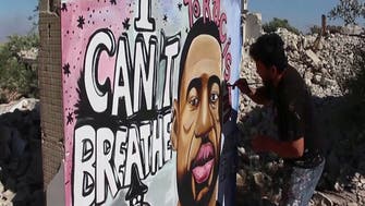 Idlib artist sends world message through mural of George Floyd