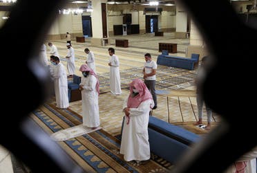 Muslims perform the Al-Fajr prayer inside the al-Rajhi Mosque while practicing social distancing in Riyadh. (File photo: Reuters)