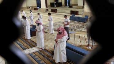 Muslims perform the Al-Fajr prayer inside the Al-Rajhi Mosque while practicing social distancing, after the announcement of the easing of lockdown measures amid the coronavirus disease (COVID-19) outbreak, in Riyadh, Saudi Arabia May 31, 2020. (Reuters)