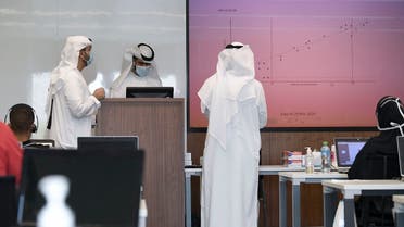 Operators man their posts at Dubai's COVID-19 Command and Control Centre at Mohammed bin Rashid University, in the United Arab Emirates, on June 1, 2020. (AFP)