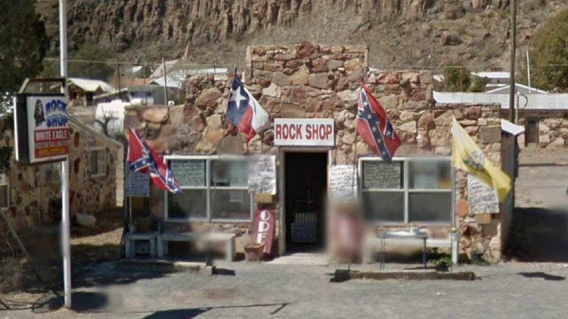 Photographs reportedly show White Eagle’s “Rock Shop” in person showed numerous Confederate flags. (Screengrab)