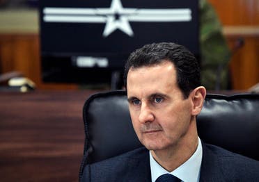 Syrian President Bashar Assad listens to Russian President Vladimir Putin during their meeting in Damascus, Syria on Jan. 7, 2020. (AP)