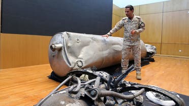 Arab Coalition spokesman Colonel Turki al-Malki displays the debris of a ballistic missile which he says was launched by Yemen's Houthi group towards the capital Riyadh, during a news conference in Riyadh, Saudi Arabia on March 29, 2020. (Reuters)