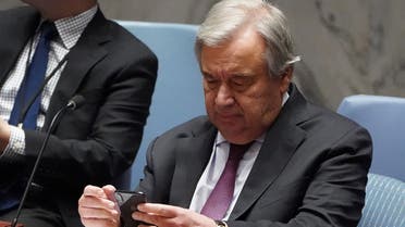 Secretary General of the United Nations Antonio Guterres looks at his phone before a Security Council meeting about the situation in Syria at United Nations Headquarters in the Manhattan borough of New York City, New York, U.S., February 28, 2020. REUTERS/Carlo Allegri