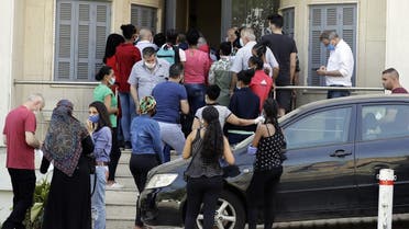 Ethiopian domestic workers wait outside their country’s consulate to register for repatriation, in Hazmieh suburb of the Lebanese capital Beirut on May 18, 2020. (AFP)