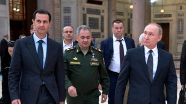 Russian President Vladimir Putin, right, Syrian President Bashar Assad, left, and Russian Defense Minister Sergei Shoigu, center, visit the Umayyad Mosque in Damascus, Syria, Tuesday, January 7, 2020. (File photo: AP)