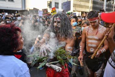 A man in aboriginal dress takes part in the Black Lives Matter protests in Sydney, June 6, 2020. (AFP)
