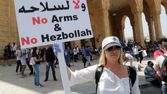 Splinters in Lebanon protests emerge as some call for Hezbollah disarmament