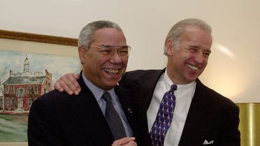 General Colin Powell, left, and then-Sen. Joe Biden pose for photographers on Capitol Hill on Jan. 9, 2001. (File photo: AP)