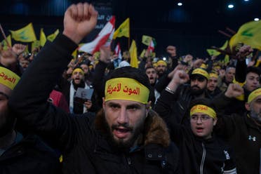 Supporters of Hezbollah chant slogans ahead of the leader's televised speech in a southern suburb of Beirut, Lebanon. The headbands read, Death to America. (AP)