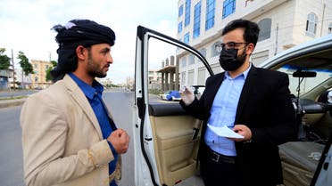 Yemeni physician Sami al-Hajj provides free medical service from his car in Sanaa on June 2, 2020. (AFP)