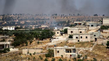 This picture taken on June 4, 2020 shows smoke plumes rising following shelling by pro-Syrian government forces in the town of Banin, north of Maaret al-Numan in Syria's northwestern Idlib province. 