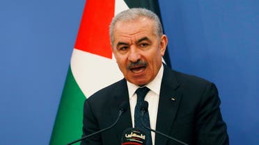Palestinian Prime Minister Mohammad Shtayyeh speaks before the start of the weekly cabinet meeting in Ramallah in the Israeli-occupied West Bank May 11, 2020. (Reuters)