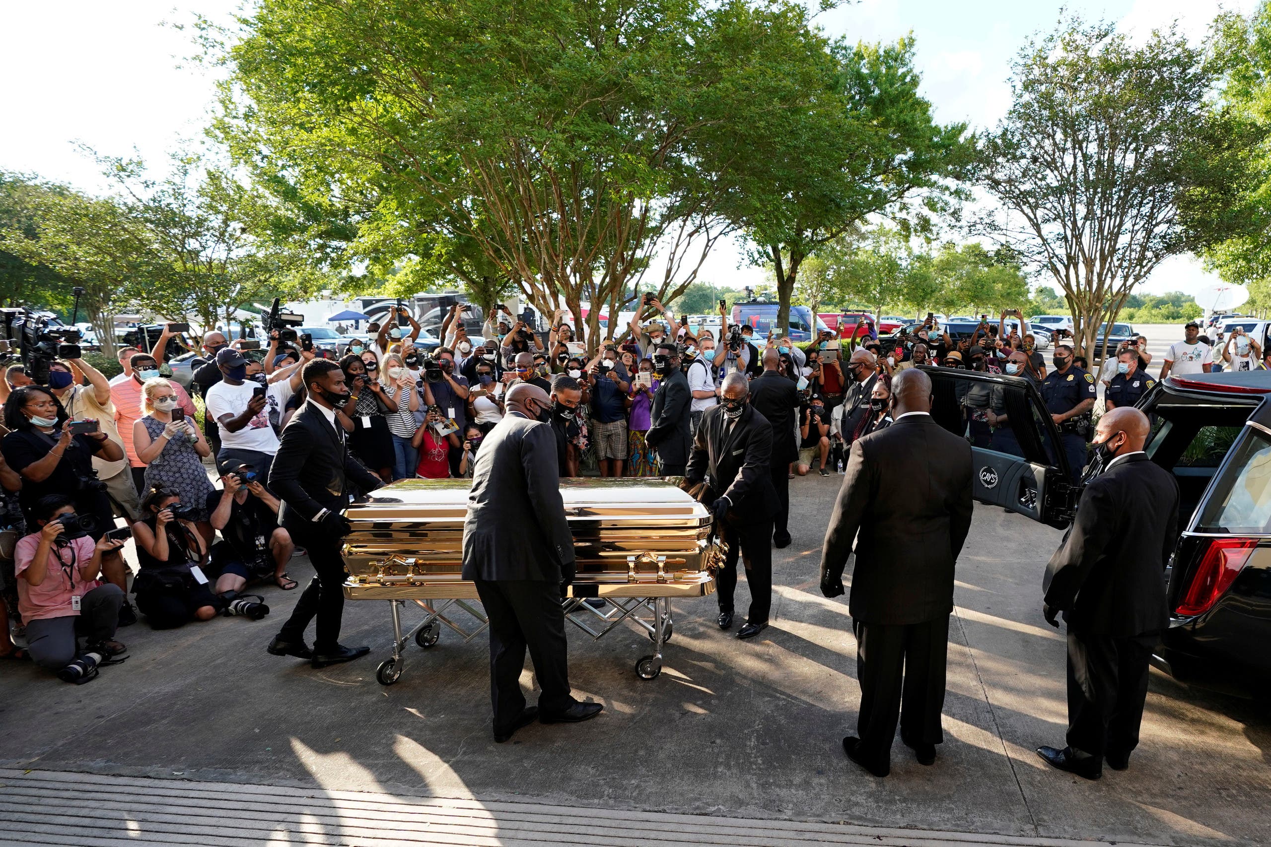 The casket of George Floyd is removed after a public visitation for Floyd at the Fountain of Praise church, Monday, June 8, 2020, in Houston, US. (Reuters)