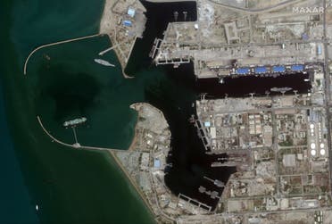 In this Sunday, June 7, 2020 satellite photo provided by Maxar Technologies, a fake aircraft carrier is seen off the coast of Bandar Abbas, Iran. (Satellite image ©2020 Maxar Technologies via AP)