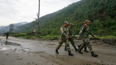 Indian army soldiers march near an army base on India's Tezpur-Tawang highway, which runs to the Chinese border, in the northeastern Indian state of Arunachal Pradesh May 29, 2012. (Reuters)