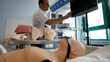 Kowalik presents Respisave, remote controlled respirator at Centre for Medical Simulation MedExcellence in Warsaw. (Reuters)