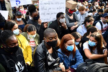 People gather in place de la Republique in Paris, on June 9, 2020, during a demonstration against racism and police brutality in the wake of the death of George Floyd. (AFP)