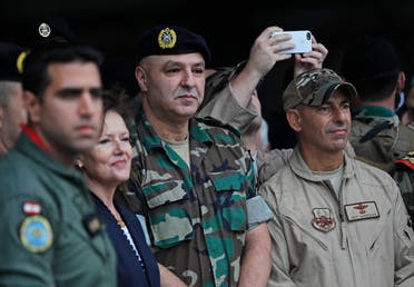 Lebanese Army Commander Gen. Joseph Aoun, center, with then-US Ambassador to Lebanon Elizabeth Richard, second left, at Hamat military air base, in north Lebanon on Oct. 31, 2017. (AP)