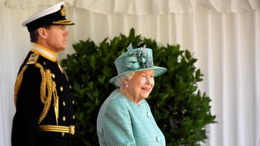 Britain’s Queen Elizabeth II attends a ceremony to mark her official birthday at Windsor Castle in Windsor, southeast England on June 13, 2020. (AFP)