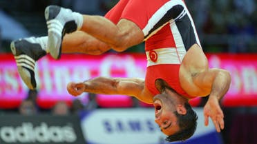 Hamza Yerlikaya celebrating a Greco-Roman wrestling victory at the World Wrestling Championship in Budapest in 2005. (File photo: Reuters)