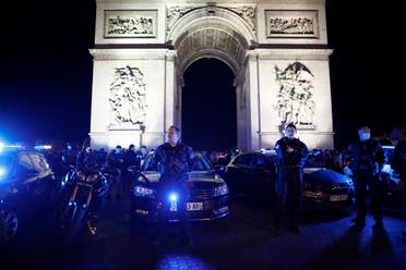 Police officers demonstrate against French Interior Minister Christophe Castaner’s reforms following the death in police custody of George Floyd, near Arc de Triomphe in Paris, France, June 14, 2020. (Reuters)