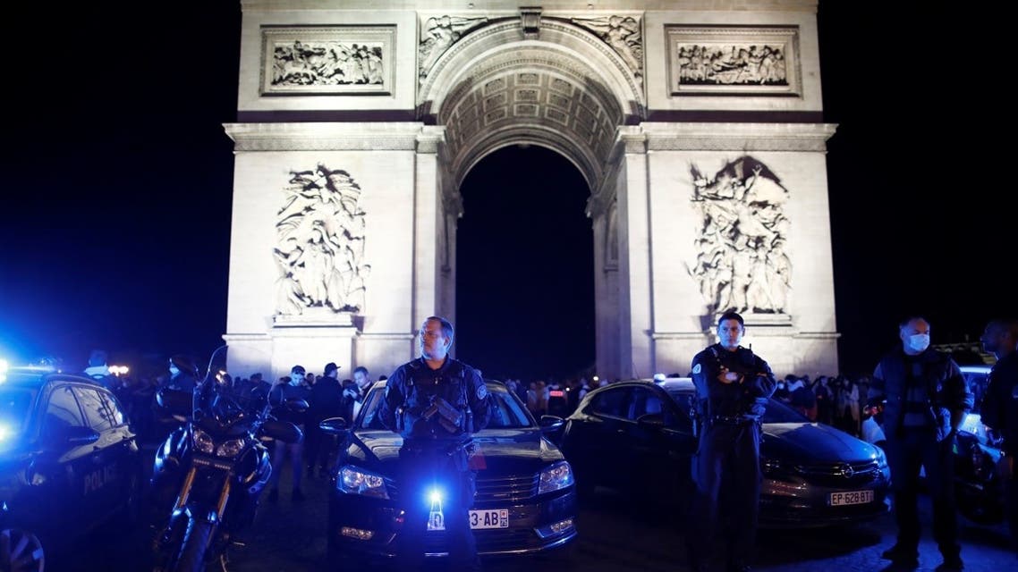 Police officers attend a demonstration against French Interior Minister Christophe Castaner's reforms, including ditching a controversial chokehold method of arrest, following the death in Minneapolis police custody of George Floyd, near Arc de Triomphe in Paris, France, June 14, 2020. (Reuters)