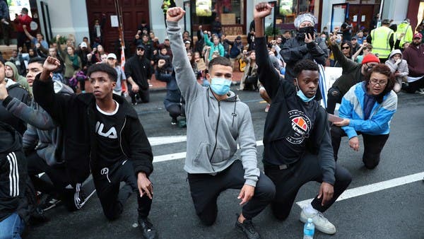 Thousands of protesters in New Zealand take knee outside US consulate