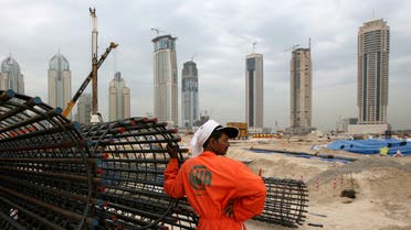 A construction worker rests at a site in Dubai. (Reuters)