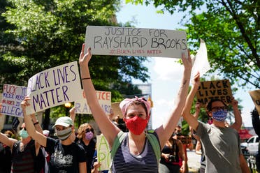 Protesters rally against racial inequality and the police shooting death of Rayshard Brooks, in Atlanta, Georgia, US June 13, 2020. (Reuters)