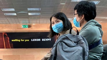 Passengers wear protective masks following the outbreak of the coronavirus disease (COVID-19) at Luxor International Airport in Luxor, Egypt. (File photo: Reuters)
