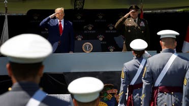 US President Donald Trump salutes alongside US Army Lieutenant General Darryl Williams, the Superintendent of the US Military Academy at West Point, in New York, June 13, 2020. (Reuters)