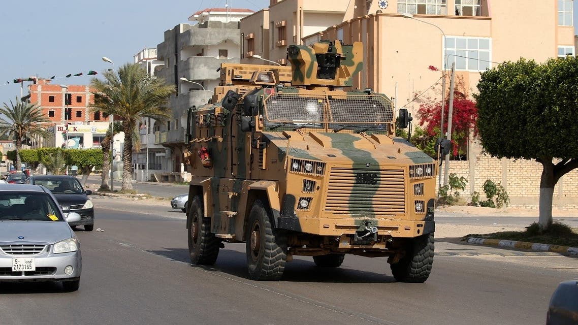 A Turkish-made armoured personnel vehicle, drives down a street in the Libyan coastal city of Sorman on April 13, 2020. (AFP)