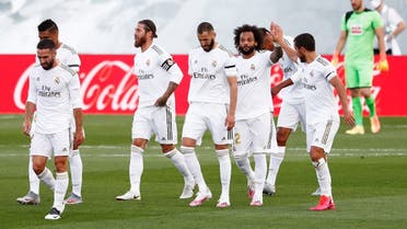 Real Madrid's Sergio Ramos celebrates scoring their second goal with teammates, as play resumes behind closed doors following the outbreak of the coronavirus disease. (Reuters)