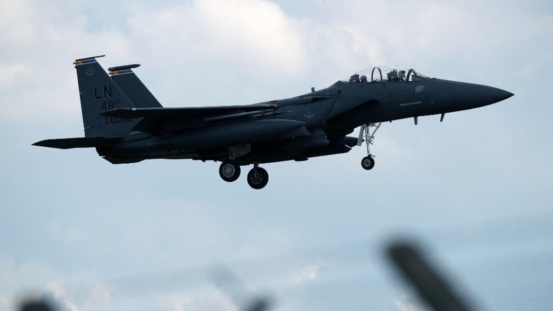A US Air Force F-15E Strike Eagle fighter jet is pictured as it prepares to land at RAF Lakenheath, east of England, on June 15, 2020. (AFP)