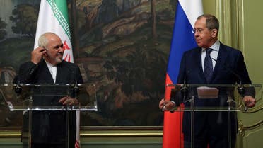 Russian Foreign Minister Sergei Lavrov and his Iranian counterpart Mohammad Javad Zarif hold a press conference following their meeting in Moscow on June 16, 2020. (AFP)