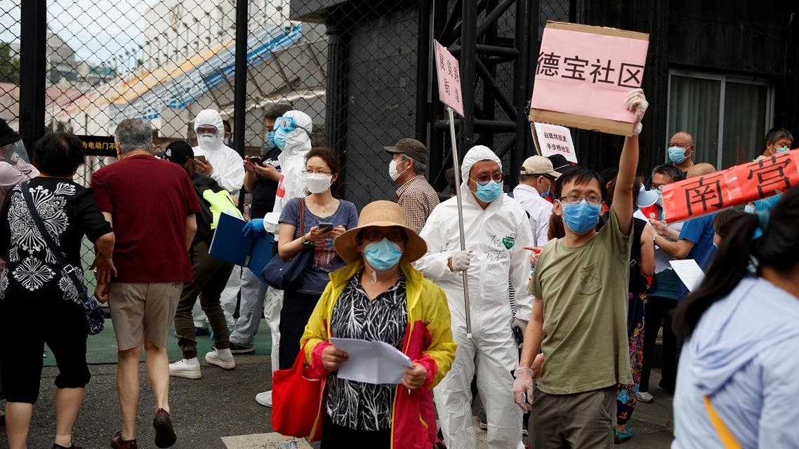 People crowd outside the Guangan Sport Center to get tested after an unexpected spike of cases of the coronavirus disease (COVID-19) in Beijing, China June 15, 2020. (Reuters)