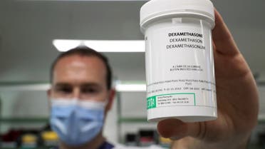A pharmacist displays a box of Dexamethasone at the Erasme Hospital amid the coronavirus disease (COVID-19) outbreak, in Brussels, Belgium, June 16, 2020. (Reuters)