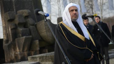 Dr. Mohammad Al-Issa, Secretary General of the Muslim World League speaks next to the memorial monument in the former German Nazi death camp Auschwitz-Birkenau on January 23, 2020. (AFP)