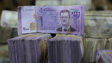 Syrian pounds are pictured inside an exchange currency shop in Azaz, Syria February 3, 2020. (Reuters)
