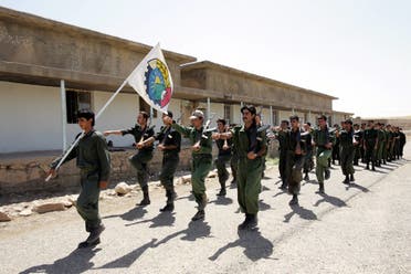 Pesmerga of the Democratic Party of Iranian Kurdistan (PDKI) march during military training at camp Koysancak in Sulaymaniyah in Iraq, 13 August 2005. (AFP)