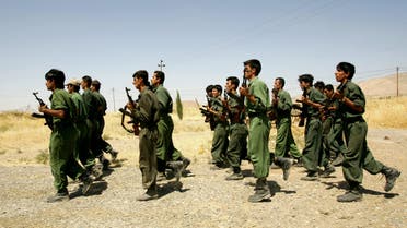 Pesmerga of the Democratic Party of Iranian Kurdistan (PDKI) train during military training at camp Koysancak in Sulaymaniyah in Iraq, 13 August 2005.  (AFP)