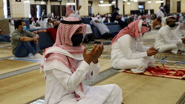 A Saudi man wearing a protective face mask performs the Friday prayers inside the Al-Rajhi Mosque, after the announcement of the easing of lockdown measures amid the coronavirus disease (COVID-19) outbreak, in Riyadh. (Reuters)