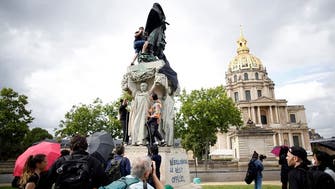 Anti-racism protesters face off with Paris police after covering Gallieni statue