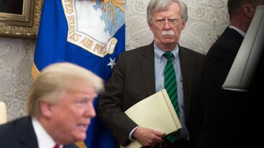 (FILES) In this file photo taken on May 13, 2019, National Security Advisor John Bolton listens while US President Donald Trump speaks to the press before a meeting with Hungary's Prime Minister Viktor Orban in the Oval Office of the White House in Washington, DC. Trump has no guiding principles and is unfit to be president, Bolton said in an interview released on June 18, 2020, to promote his explosive book. I don't think he's fit for office. I don't think he has the competence to carry out the job, Bolton told ABC News.