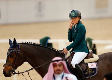 Saudi Dalma Malhas rides her horse during the Diriyah Equestrian Festival, where male and female equestrians are riding side-by-side for the first time in Riyadh Saudi Arabia. (File photo: AP)