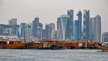 A general view taken on December 20, 2019 shows boats moored in front of the skyline of the Qatari capital, Doha. (AFP)