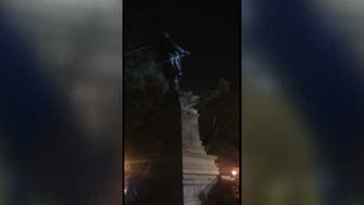 US protesters topple, burn Confederate statue after Juneteenth rallies