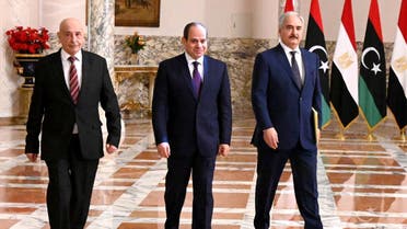 A handout picture released by the Egyptian Presidency on June 6, 2020 shows Egyptian President Abdel Fattah al-Sisi (C), Libyan commander Khalifa Haftar (R) and the Libyan Parliament speaker Aguila Saleh arriving for a joint press conference in the capital Cairo.  (AFP)